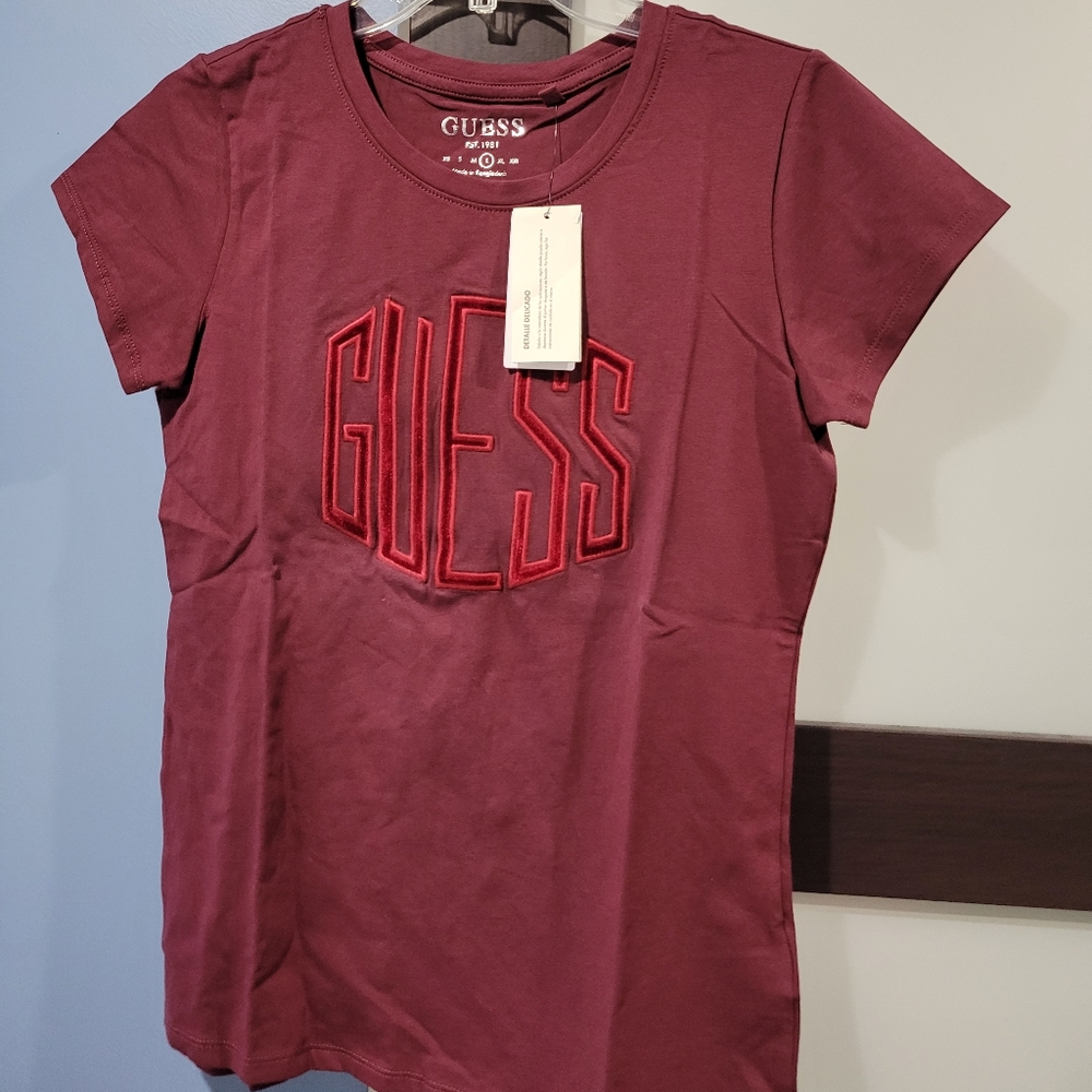 136. Guess logo art deco women's tee shirt